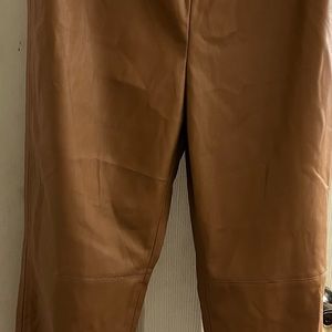 Hi rise leather leggings with side zip may fit a size down better.
